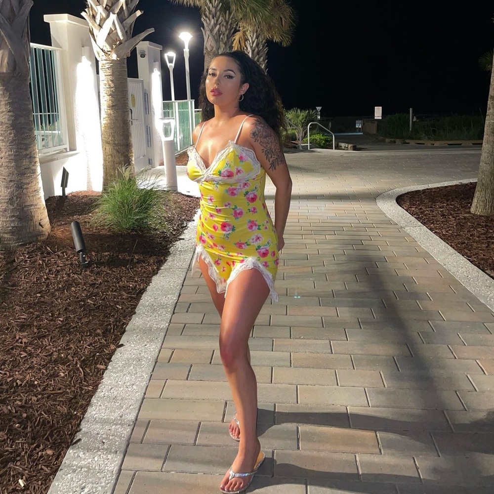 Yellow floral mini dress with lace detailing